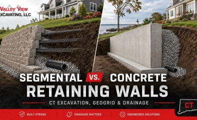 Segmental Retaining Walls vs. Poured Concrete in CT: Excavation, Geogrid & Drainage Guide